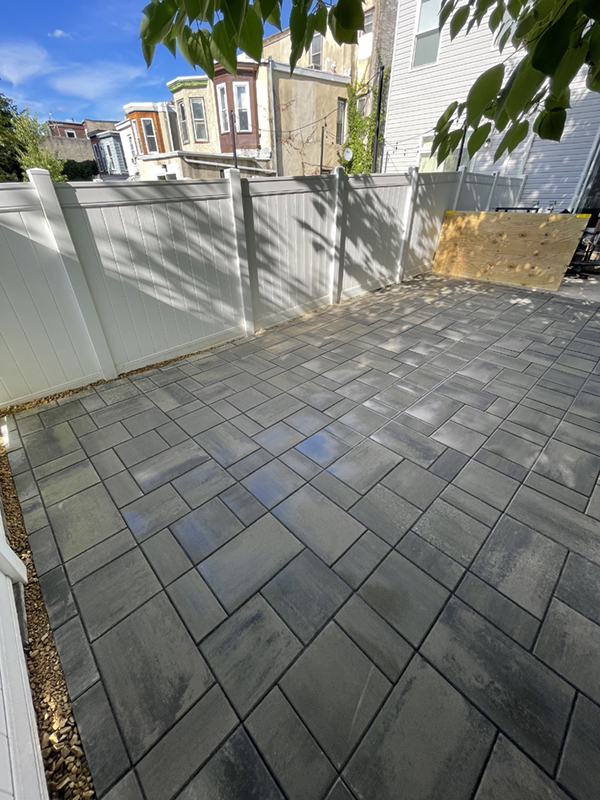 Techo Bloc Blu 60 Smooth patio slabs in large Brewerytown backyard.